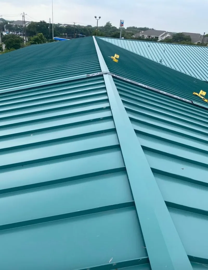Green commercial metal roof ridge and valley for Metal Roof Repair in Courtland